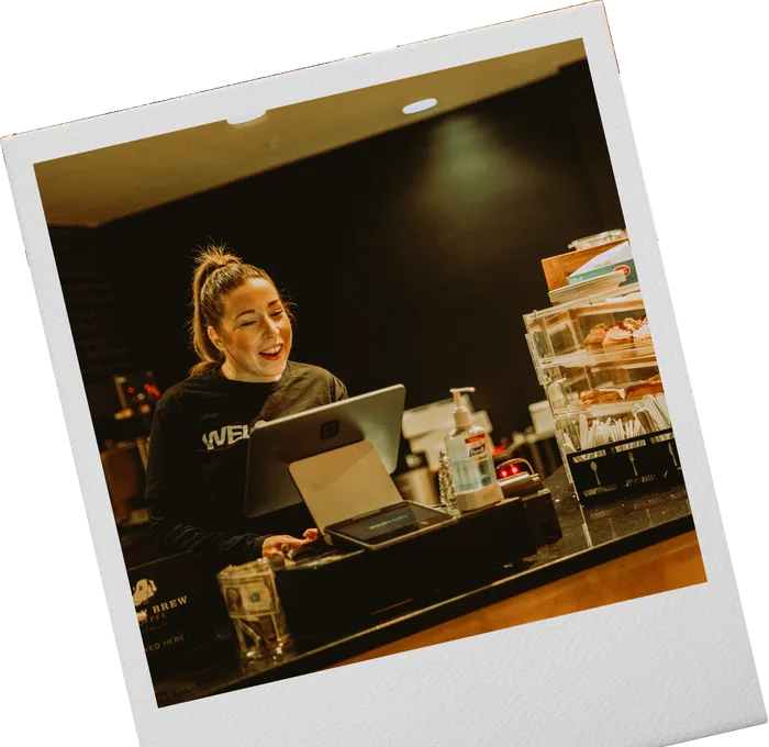 A volunteer serving at the church coffee bar